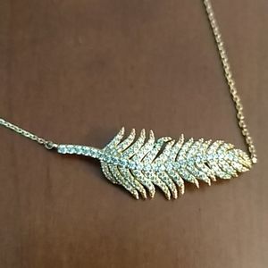 Rhinestone encrusted feather necklace